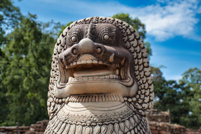 Close-up of statue against sky