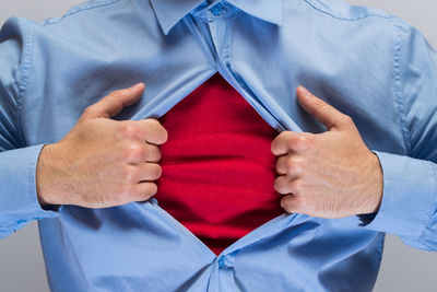 Midsection of man wearing mask