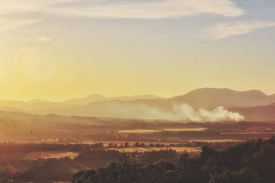 Scenic view of landscape against sky during sunset