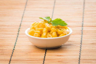 Close-up of fresh vegetables in bowl on table