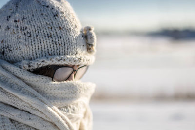 Close-up of woman in knit hat