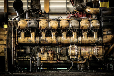 Close-up of old machinery in factory