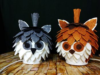 Close-up of artificial butterfly on table