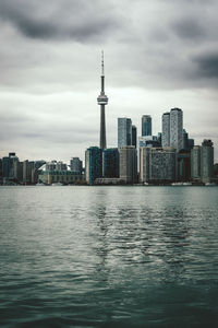 Modern buildings in city against sky