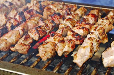 Close-up of meat on barbecue grill