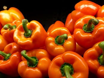 Red bell peppers for sale at market stall