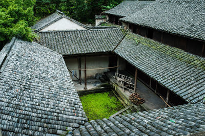 High angle view of old house by building
