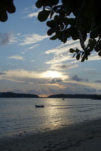 Scenic view of sea at sunset