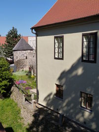 Houses against sky in town