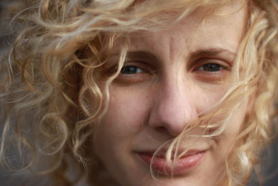 Portrait of blond curly hair woman