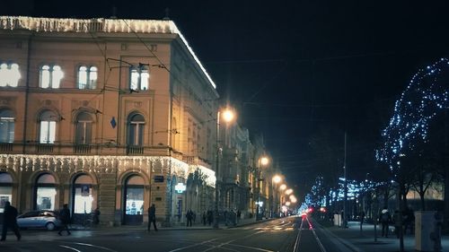 Cars on road at night