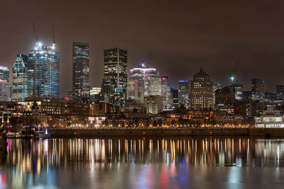 Montréal skyline at night reflection in river