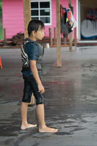 Full length of boy standing outdoors