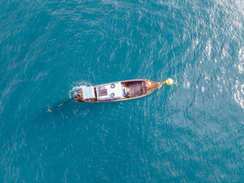 High angle view of ship sailing in sea