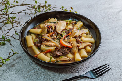 High angle view of noodles in bowl on table