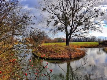 Scenic view of lake against sky during autumn