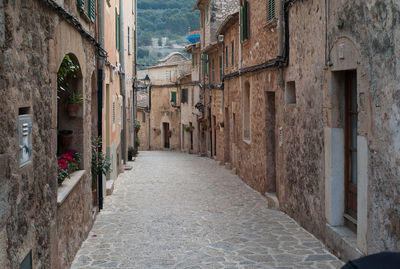 Alley amidst buildings in valldemossa