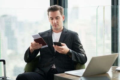 Young man using mobile phone