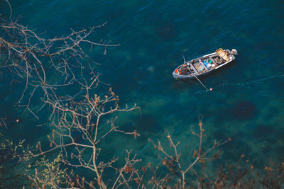 High angle view of ship sailing in sea