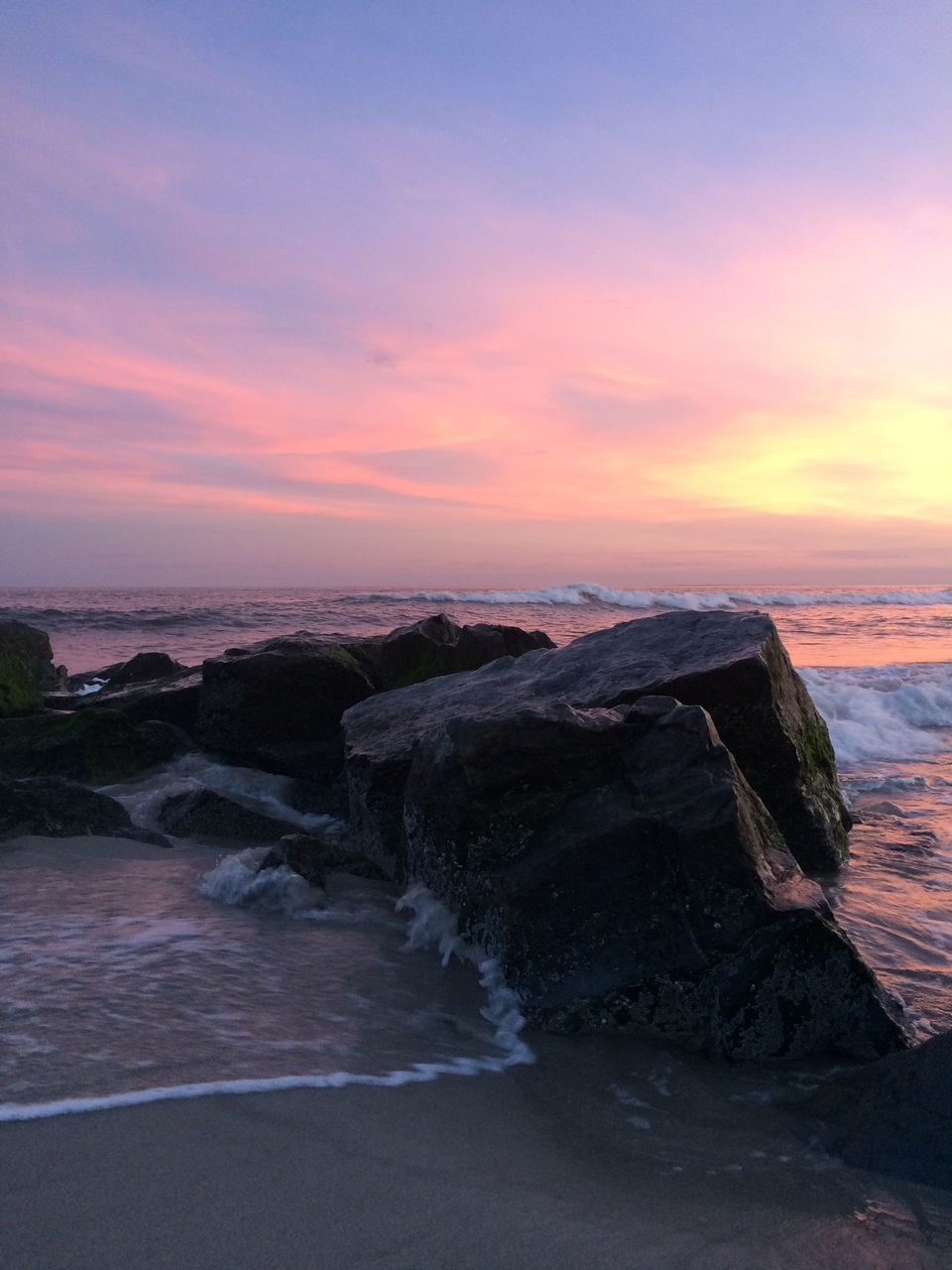 sunset, water, sea, sky, scenics, orange color, horizon over water, beauty in nature, nature, rock - object, cloud - sky, tranquil scene, beach, wave, shore, idyllic, tranquility, built structure, surf, building exterior