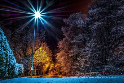 Illuminated street light at night