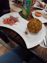 High angle view of food served on table in restaurant