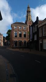 View of building against cloudy sky