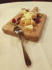 High angle view of chopped cake on table