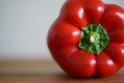 Close-up of red bell peppers on table