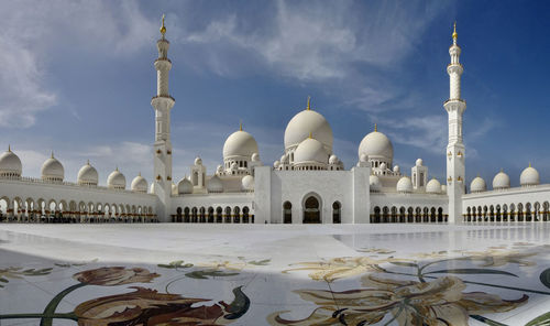 Low angle view of mosque against sky