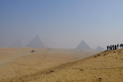 Scenic view of desert against clear sky