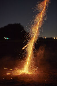 Firework display at night