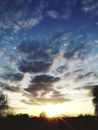 Low angle view of dramatic sky during sunset