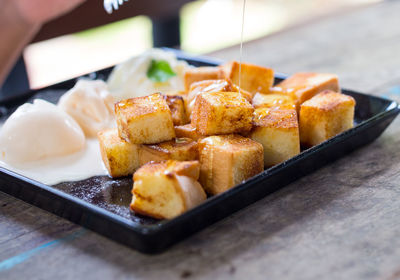 Close-up of food in plate on table