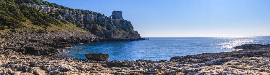 Scenic view of sea against clear blue sky