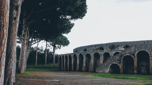 Amphitheatre of pompeii against clear sky