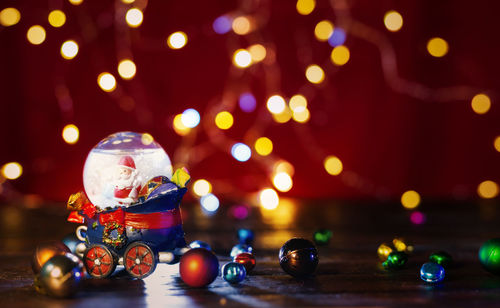 Close-up of christmas lights on table