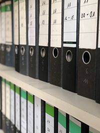 Full frame shot of files on shelf in office