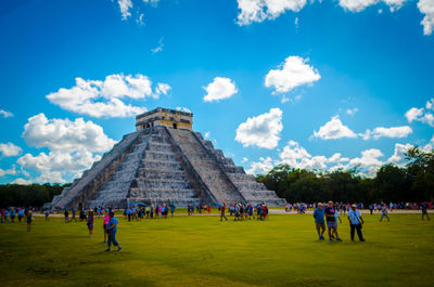 Group of people in front of historical building