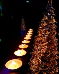 Close-up of illuminated christmas lights on table