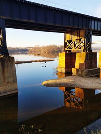 View of bridge over river against sky