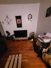 Tables and chairs on hardwood floor at home