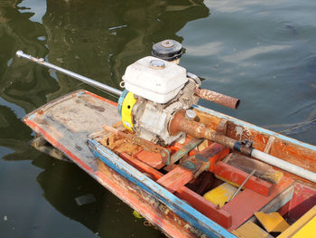 High angle view of boat moored at lake