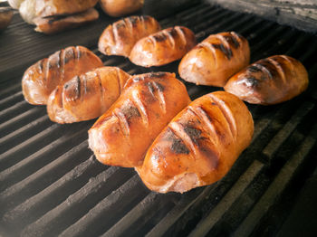 High angle view of meat on barbecue grill