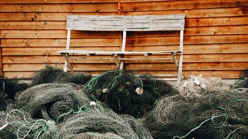 Close-up of fishing net against wall