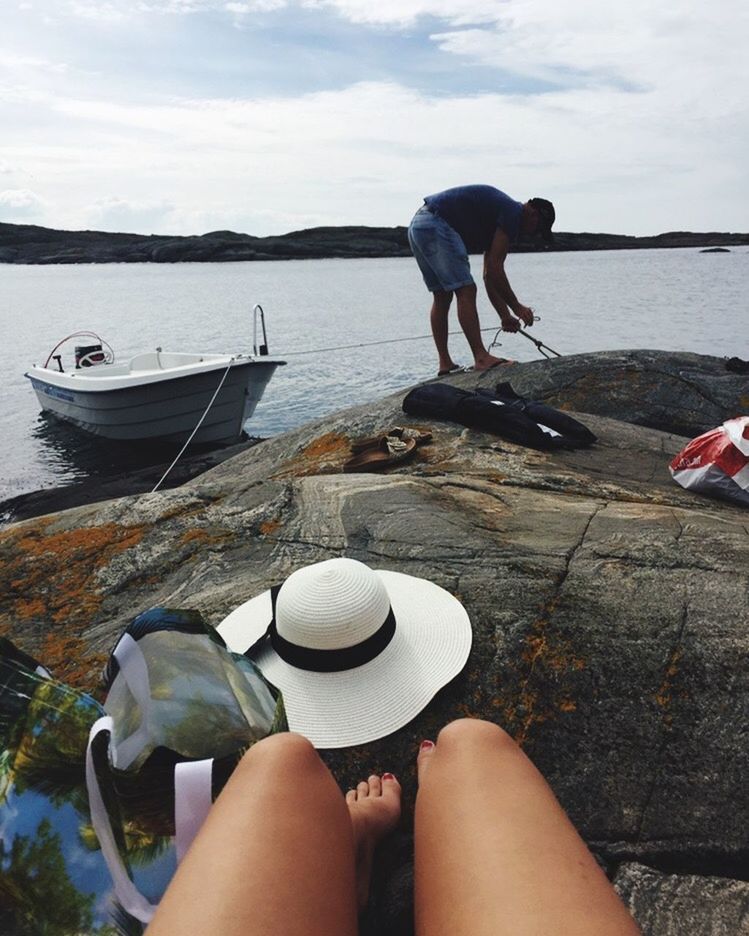 real people, leisure activity, water, day, lifestyles, men, outdoors, two people, nautical vessel, standing, holding, casual clothing, women, low section, nature, full length, sea, togetherness, sitting, friendship, sky, young adult, adult, people