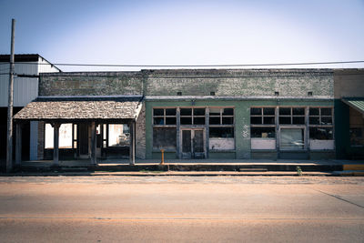 Abandoned building against clear sky