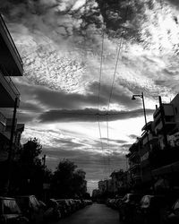 View of road against cloudy sky