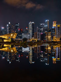 Illuminated buildings in city at night
