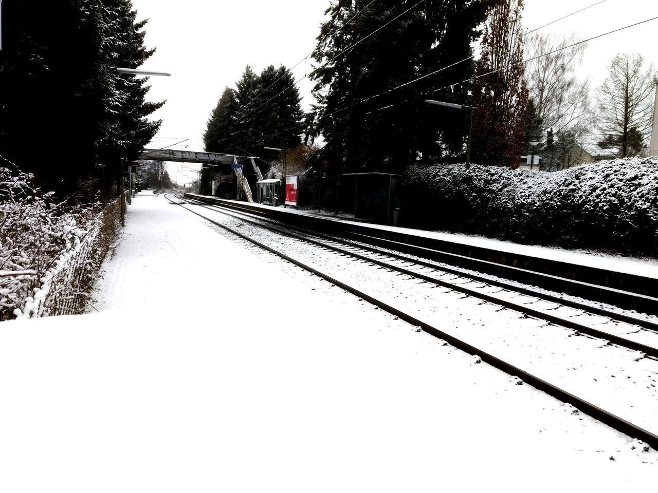 VIEW OF RAILWAY TRACKS IN WINTER